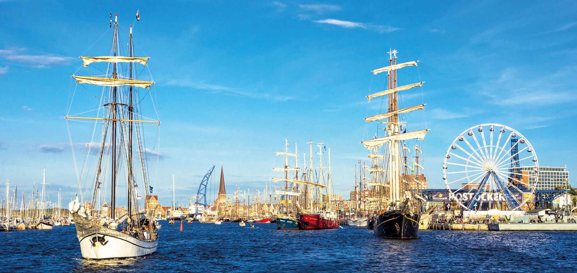 Segelschiff chartern mit NORD EVENT - Travemuender Woche - Riesenrad am Tag mit Segelschiffen