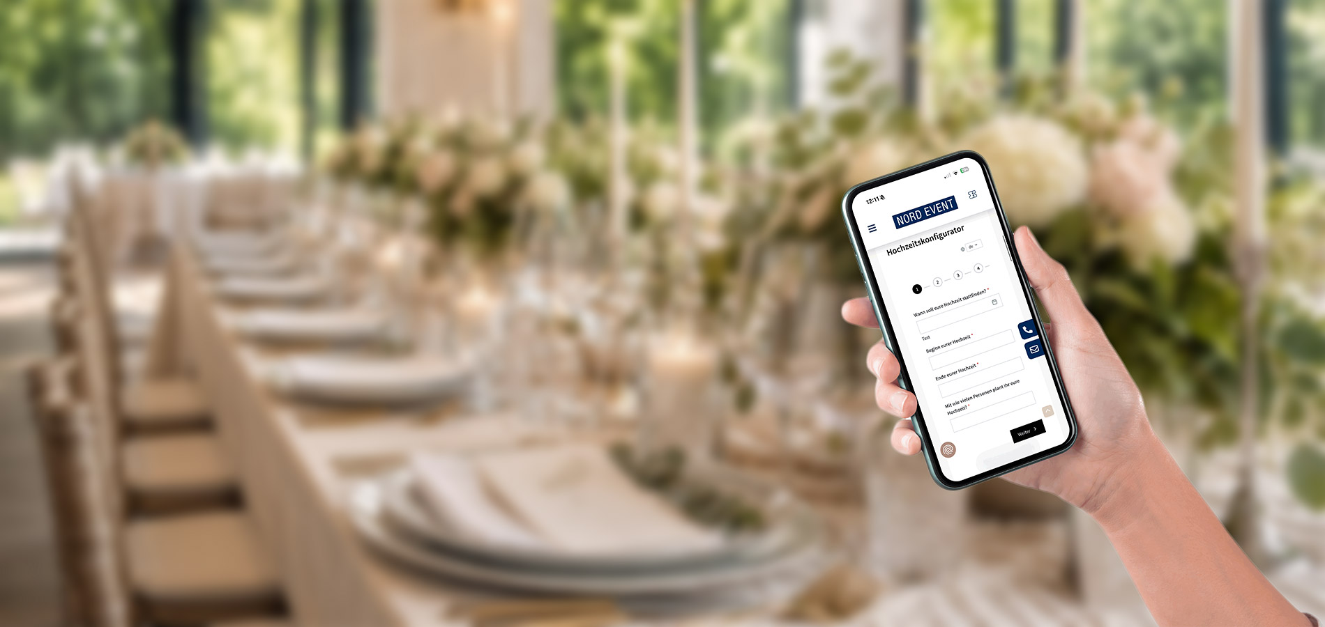 Hand holding a smartphone displaying a wedding configurator form, with a blurred wedding reception in the background.